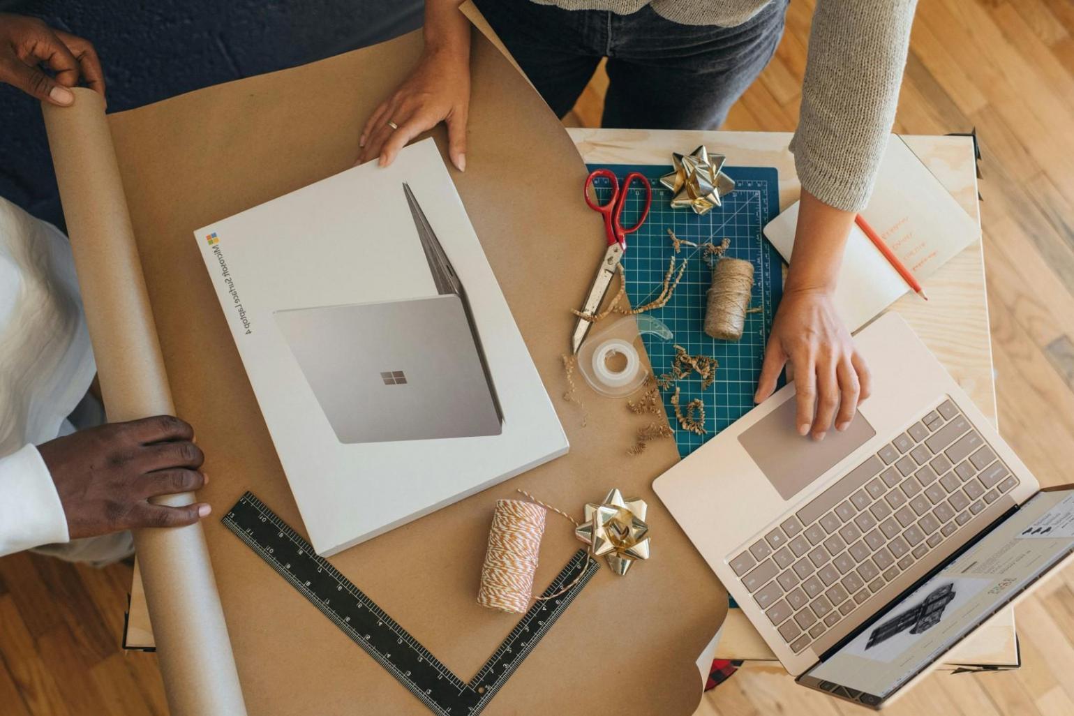 Professional analyzing SEO audit data on multiple screens